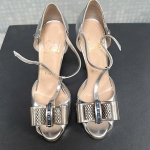 Beautiful and rare to find Christian Louboutin heels .